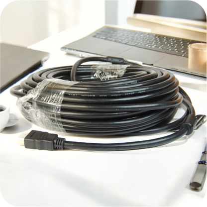 Cable HDMI de 20 metros enrollado, ideal para conexiones de alta definición a larga distancia