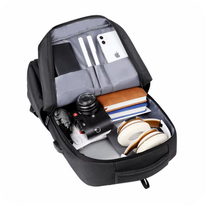Interior de morral para cámara con espacio para laptop, teléfono y accesorios fotográficos