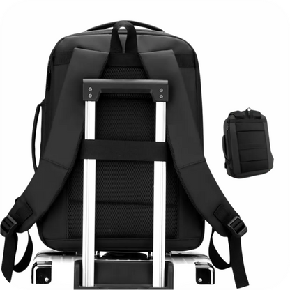 morral negro con cinta de equipaje  para viaje